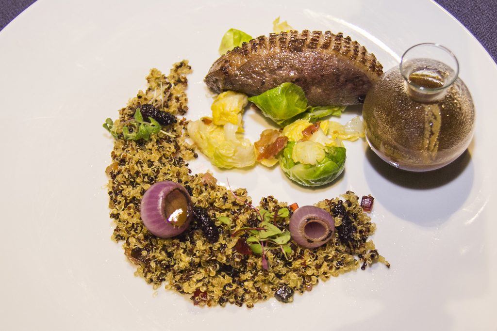 confit of duck breast marsala with fried quinoa, burnt coconut